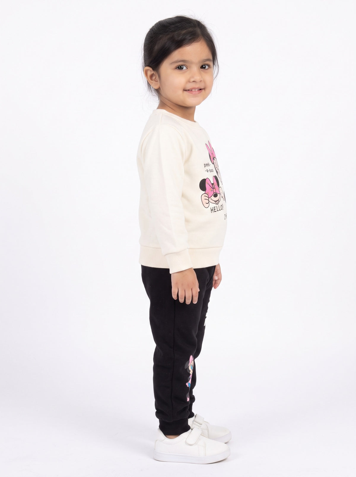 Girls cream and black Minnie tracksuit side view
