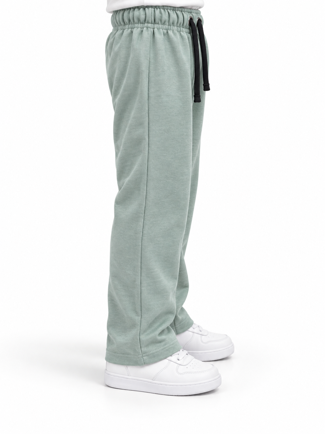 Sage green kids trouser side view